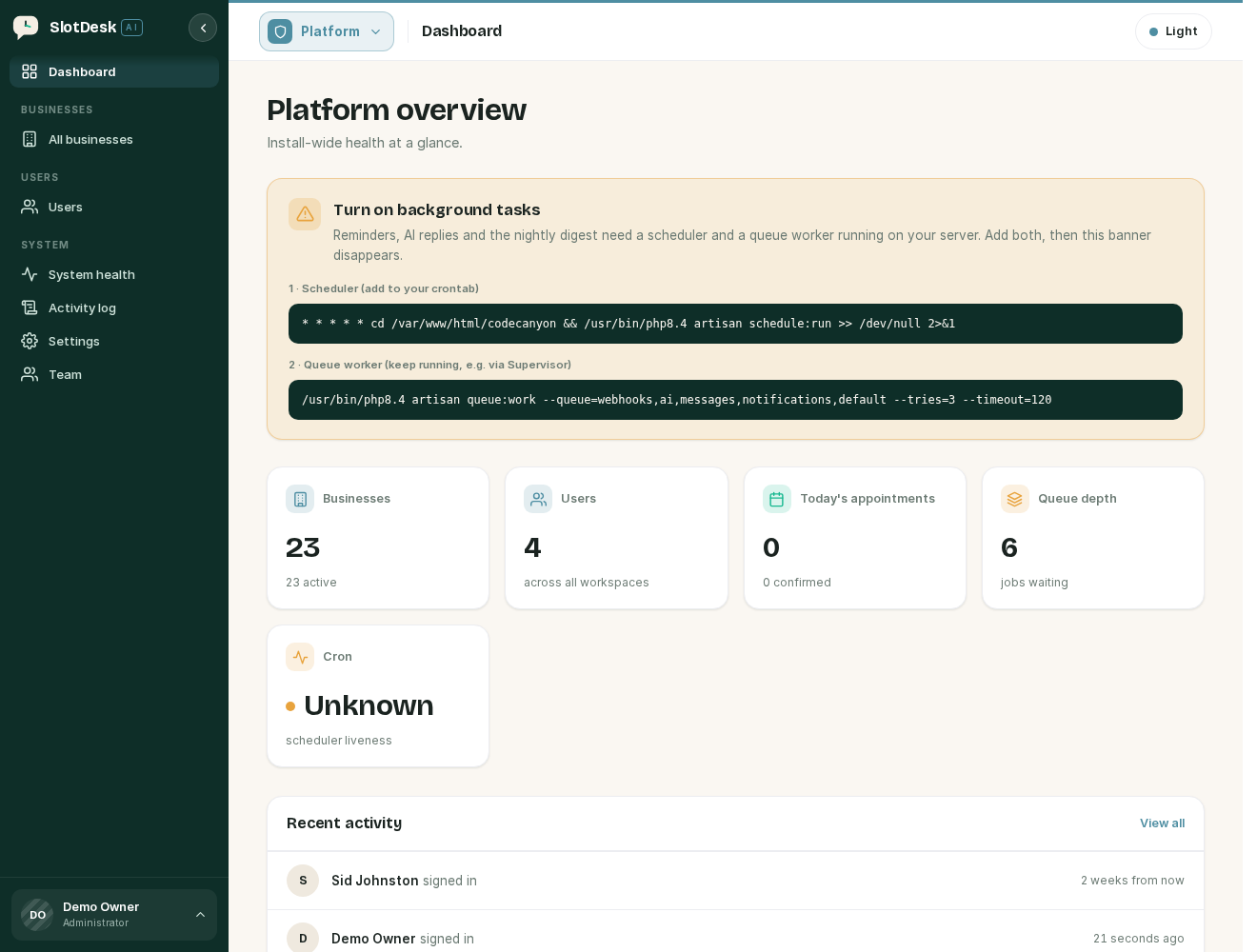 The admin dashboard, with the background tasks banner and both commands.