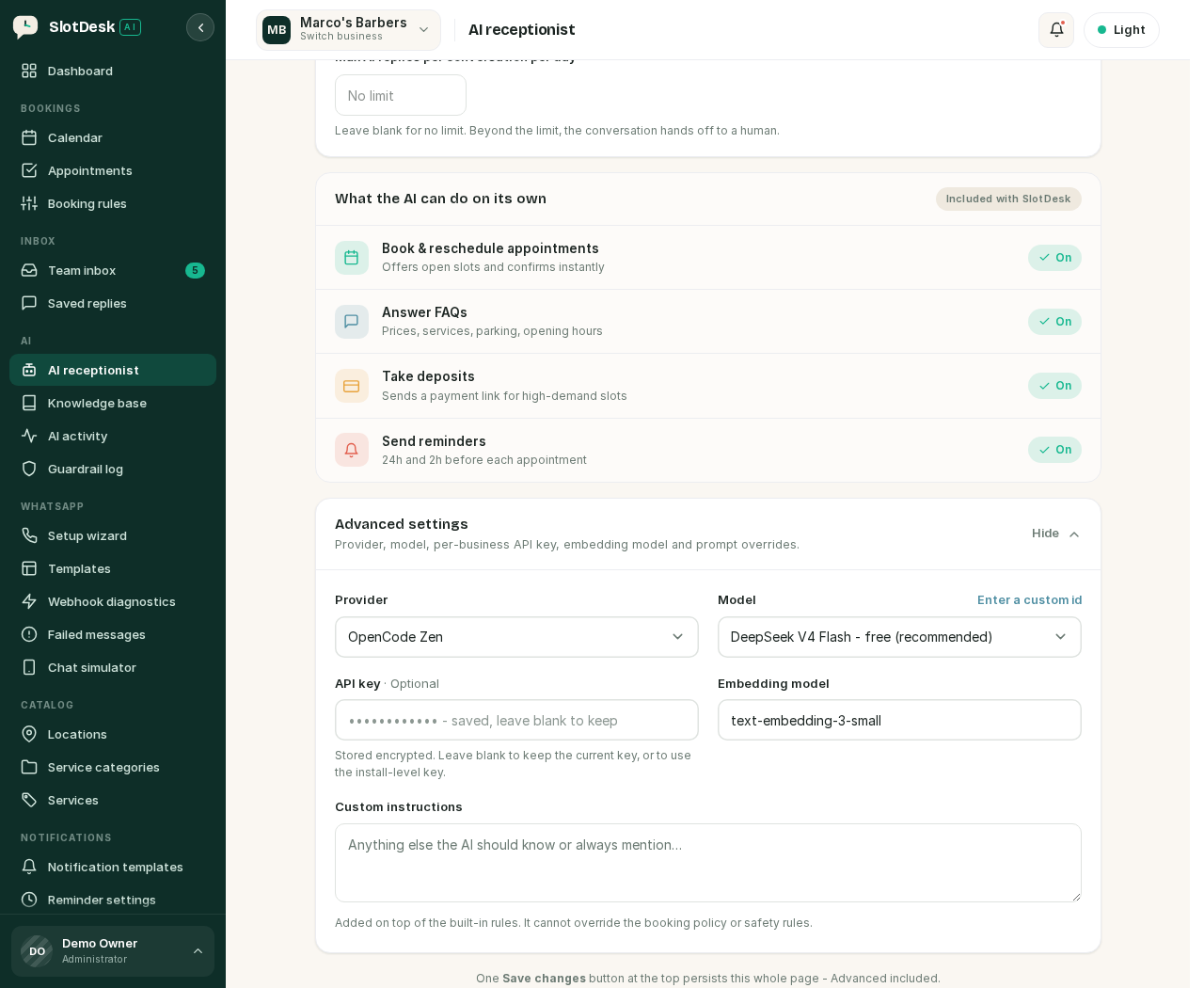 Advanced settings: provider, model, the per-business key, the embedding model and custom instructions.